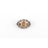 Property of a deceased estate - a Victorian diamond & topaz oval brooch, the old cut diamonds