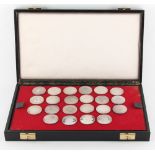 Property of a gentleman - a cased set of twenty-two Swiss silver medallions, approximately 376 grams