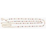 Property of a lady - an attractive yellow gold chain necklace set with alternating diamonds, rubies,