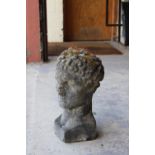 Property of a deceased estate - a well weathered reconstituted stone garden bust of a classical man,