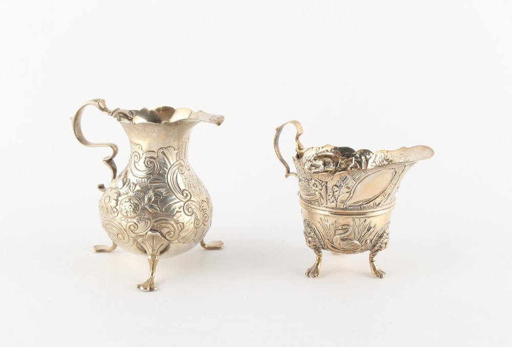 Property of a lady - a George II silver baluster cream jug, with trefid feet, London 1746;