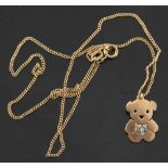 Property of a deceased estate - a 9ct gold teddy bear pendant set with six small round cut diamonds,