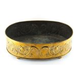 Property of a lady - an early 20th century Art Nouveau brass oval planter with embossed stylised