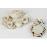 Property of a lady - a late 19th / early 20th century Sitzendorf floral encrusted porcelain & cherub