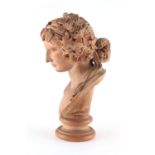 Property of a lady - a late 19th / early 20th century terracotta bust of a classical maiden, her