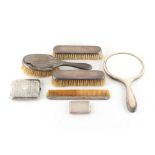 Property of a lady - a silver mirror & brush set; together with a silver cigarette case; and a