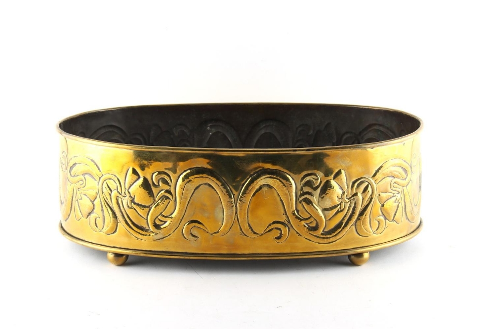 Property of a lady - an early 20th century Art Nouveau brass oval planter with embossed stylised - Image 2 of 2