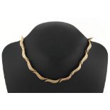 Property of a deceased estate - a 9ct yellow gold leaf link necklace, 15.75ins. (40cms.) long,