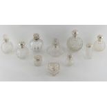 Property of a lady - ten silver topped scent bottles & dressing table jars, Victorian & early 20th