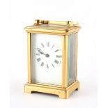 Property of a deceased estate - a late 19th / early 20th century brass corniche cased carriage clock