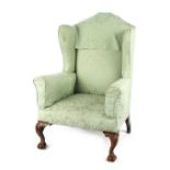 Property of a deceased estate - a George III style mahogany & green upholstered wing armchair,