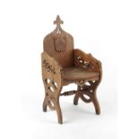 Property of a deceased estate - a Gothic carved oak chair.