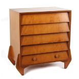 Property of a deceased estate - a mid 20th century chest of five long drawers, of cascading form,