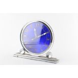 Property of a gentleman - an Art Deco chrome or nickel plated & blue glass mantel clock, 8.6ins. (22
