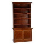 Property of a lady - a good quality late Victorian oak two-part bookcase, with bevelled glass