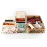 Property of a lady - a box containing assorted costume jewellery including coral, jet & agate