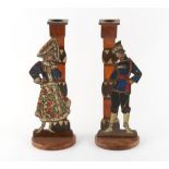 Property of a lady - a pair of Continental, probably French painted wood cut out candlesticks,