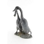 Property of a deceased estate - a bronze model of two runner ducks, 14ins. (35.5cms.) high.