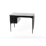 Property of a gentleman - a Continental black painted desk, third quarter 20th century, stamped '120