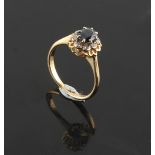 Property of a deceased estate - an 18ct yellow gold sapphire & diamond oval cluster ring, the