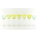Property of a lady - a set of five tall uranium glass hock glasses, 8.75ins. (22.2cms.) high;