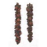 Property of a lady - a pair of late 19th century Continental carved & painted wood wall appliques