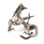 Property of a gentleman - a Japanese white metal table lighter modelled as a dragon, Meiji period (