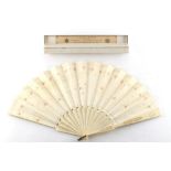 Property of a lady - a late 19th century painted vellum fan, with pierced bone guards & sticks,