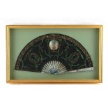 Property of a lady - a late 19th / early 20th century sequined black lace fan with mother-of-pearl