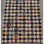 Property of a lady - a late 19th / early 20th century silk patchwork quilt, with blue silk