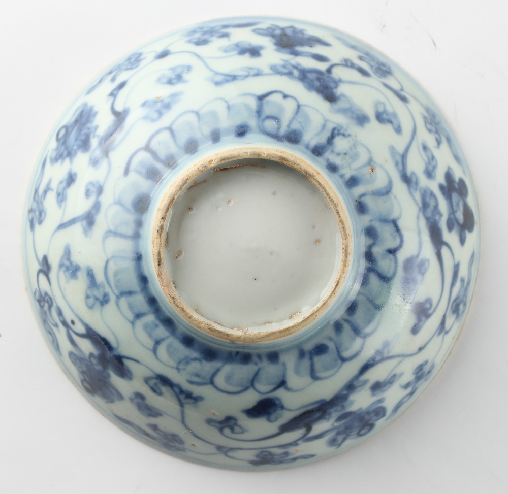 Property of a lady - an 18th century Chinese blue & white bowl, painted with flowers & shrubs - Image 4 of 6