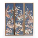A set of three early 20th century Chinese kesi panels depicting hunting scenes, in matching glazed