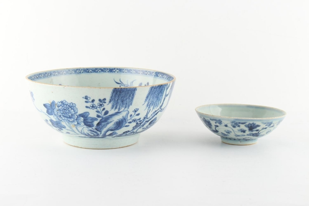 Property of a lady - an 18th century Chinese blue & white bowl, painted with flowers & shrubs