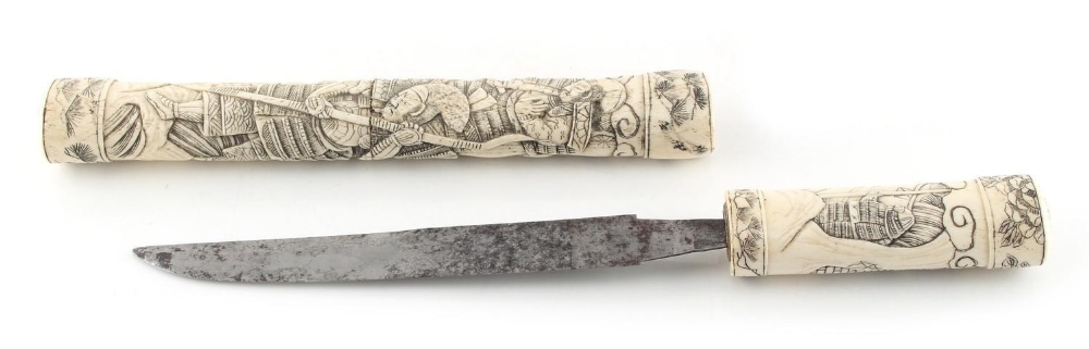 Property of a lady - a late 19th / early 20th century Japanese carved bone tanto, 13.25ins. (33.