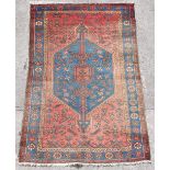 Property of a lady of title - a Persian Hamadan rug, 76 by 51ins. (193 by 130cms.).