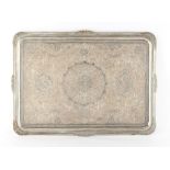 Property of a gentleman - a good quality Indian or Islamic silver rectangular tray, with all-over