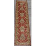 Property of a deceased estate - a Ziegler style runner, 120 by 32ins. (304 by 80cms.).
