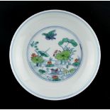 A Chinese doucai saucer dish painted with a pond scene, underglaze blue Kangxi 6-character mark, 4.
