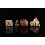 Property of a deceased estate - a group of four assorted items including a carved marble fragment,