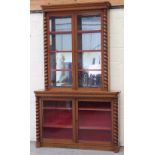 Property of a lady - a Victorian oak two-part bookcase, with barleytwist pilasters, 54.25ins. (