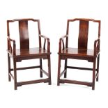 A pair of 19th century Chinese hongmu throne chairs, parts possibly huanghuali (2). Provenance -