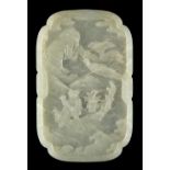 A Chinese carved white jade rounded rectangular plaque or panel, 18th / 19th century, with re-