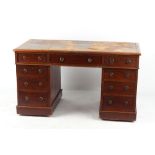 Property of a gentleman of title - a late Victorian mahogany twin pedestal desk, 53ins. (134.
