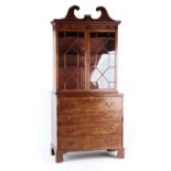 Property of a gentleman of title - a George III mahogany secretaire bookcase, with swan-neck