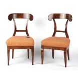 Property of a lady - a pair of early 19th century North European fruitwood side chairs, with