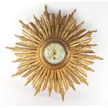 Property of a deceased estate - a late 19th / early 20th century giltwood sunburst wall clock, the