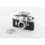 Property of a gentleman - a Leitz Wetzlar Leica M2 camera, 1960, serial number 1011517, with Elmar