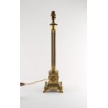 Property of a lady of title - a gilt brass Corinthian column table lamp, one paw foot stamped '