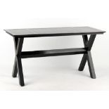 Property of a gentleman of title - a modern black painted table with 'X'-frame supports, 59ins. (