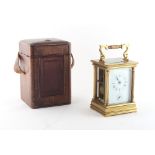 Property of a lady - a large late 19th century brass pillars cased carriage clock, the three train